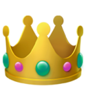 Golden crown with colorful gems on a white background