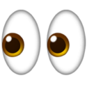 Pair of cartoon eyes looking to the side, with brown irises on a white background