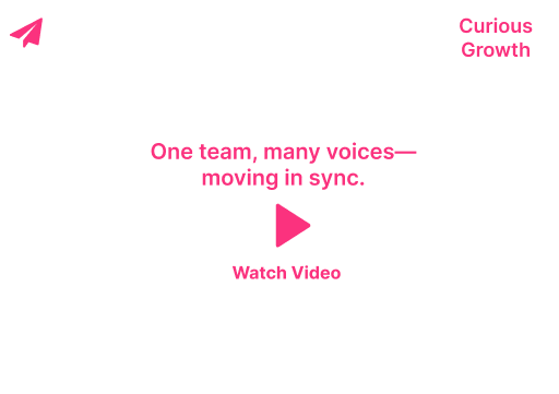 White webpage with pink “Curious Growth” text, a play icon, and “One team, many voices—moving in sync. Watch Video”